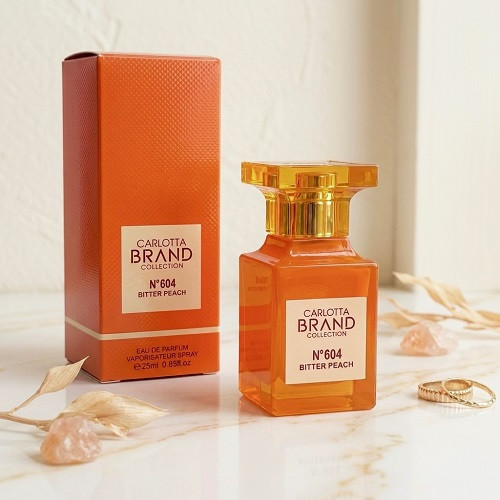 `خرید ادوپرفیوم کارلوتا مدل ۶۰۴ رایحه بیتر پیچ حجم ۲۵ میل - Carlotta Brand Collection N604